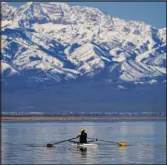  ?? ?? A person rows April 15 on the Great Salt Lake. Melting winter snowpack caused the lake to rise several feet.