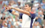  ?? AFP ?? Carlos Alcaraz celebrates after beating Stefanos Tsitsipas.