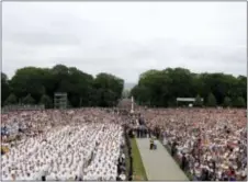  ?? STEFANO RELLANDINI — POOL PHOTO VIA AP ?? Pilgrims and faithful wait for Pope Francis before a mass in Czestochow­a, Poland,Thursday.