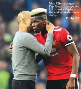  ??  ?? Man City manager Pep Guardiola speaks to United’s Pogba at the end of yesterday’s derby Photo: AP