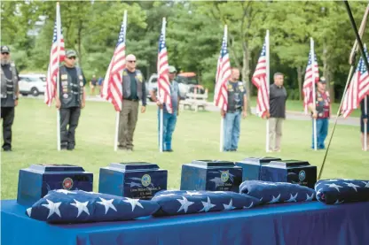  ?? DOUGLAS HOOK/HARTFORD COURANT ?? The Connecticu­t State Police and the Connecticu­t Patriot Guard Riders escorted three CFDA hearses containing the cremains from the DVA Rocky Hill Campus to the Veterans Cemetery in Middletown for four Veterans’ unclaimed cremated remains.