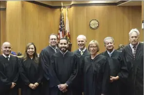  ?? ANDY VELEZ PHOTO ?? Michael Domenzain standing in the middle of the other Superior Court judges of Imperial County.
