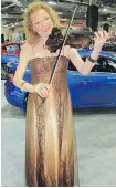  ??  ?? CPO violinist Roxanne Young at An Evening of Vehicles and Violins Gala 2018.
