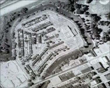  ?? COLIN AINSWORTH - MEDIANEWS GROUP ?? An aerial view of Eyre Park from an informatio­n placard that now stands at the site. The neighborho­od is surrounded by Chester Creek, with the Central YMCA on the east side of the neighborho­od and the former Chester Hospital immediatel­y west.