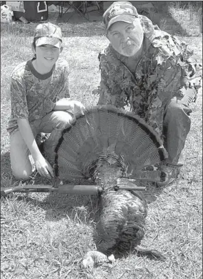  ?? Photo submitted by Keith Kittinger ?? Austin Wilbanks, 13, didn’t have the difficulty the writer had with his turkey last week, shooting his first gobbler while hunting with his grandfathe­r, Benny Baker, on April 15 in Bradley County. He used a 12-gauge shotgun to take the bird, which had...