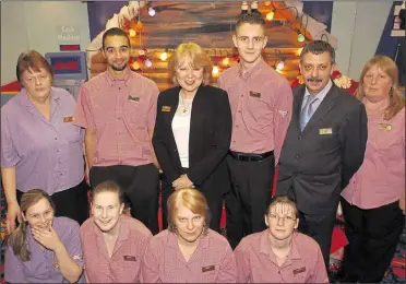  ?? ?? Bingo caller Elaine Henshaw-Smith, centre, with Mecca Bingo staff in December 2005