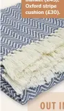 ??  ?? Herringbon­e blanket (£45); Oxford stripe cushion (£30).