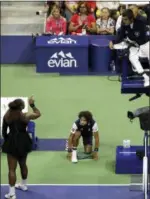  ?? SETH WENIG — THE ASSOCIATED PRESS ?? Serena Williams talks with chair umpire Carlos Ramos during the women’s final of the U.S. Open tennis tournament against Naomi Osaka, of Japan, Saturday in New York.