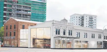  ??  ?? An artist’s impression of the Tesla retail store superimpos­ed on the existing building.