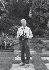  ??  ?? Jared Diamond is bird watching in his backyard at home in the Bel-Air neighborho­od of Los Angeles. — Damon Casarez/Redux/laif