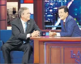  ?? Jeffrey R. Staab CBS ?? “THE LATE SHOW” host Stephen Colbert with guest Jeb Bush on Tuesday.