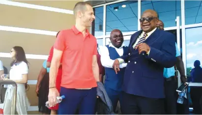  ??  ?? Uefa president Aleksander Ceferin (left) is welcomed by Cosafa boss Phillip Chiyangwa on arrival at Victoria Falls Internatio­nal Airport yesterday