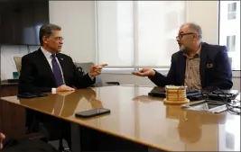  ?? PHOTOS BY NHAT V. MEYER — BAY AREA NEWS GROUP ?? United States Secretary of Health and Human Services Xavier Becerra, left, speaks with Frank Pine, executive editor of the Bay Area News Group and MediaNews Group at The Mercury News in downtown San Jose on Monday.