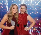  ?? TRAE PATTON / NBC ?? Brynn Cartelli, winner of “The Voice,” with her coach, pop star Kelly Clarkson.