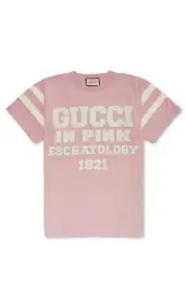  ??  ?? GUCCI
Cotton printed t-shirt / Price on request