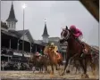  ?? MATT SLOCUM - THE ASSOCIATED PRESS ?? FILE - In this May 4, 2019, file photo, Luis Saez rides Maximum Security, right, across the finish line first against Flavien Prat on Country House during the 145th running of the Kentucky Derby horse race at Churchill Downs in Louisville, Ky.