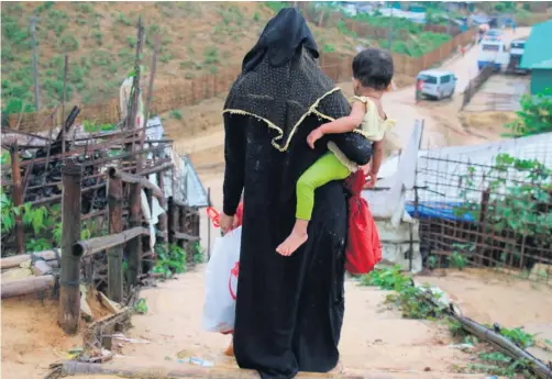  ??  ?? Crisis point: a Rohingya refugee camp in Bangladesh where the struggle against Covid-19 highlights the scale of the humanitari­an challenge