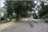  ?? RACHEL RAVINA — MEDIANEWS GROUP ?? Debris litters a stretch of Butler Avenue Friday afternoon near the site of an active investigat­ion of a house explosion on Thursday evening on Hale Street in Pottstown.