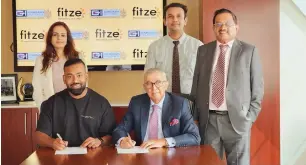  ?? ?? Mustafa Vazayil (MD – Gargash Insurance) and Ben Samuel (CEO – Fit on Click) sign the agreement, with Rajendran Murkkoth (Dy MD) and Praveen Vijayan (Dy VP) of Gargash Insurance) and Nivedita Somani (Head of Sales – Fit on Click)