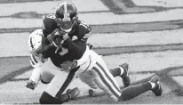  ?? DON WRIGHT/ASSOCIATED PRESS ?? Steelers wide receiver JuJu Smith-Schuster makes a touchdown catch against Colts free safety Julian Blackmon in the second half Sunday in Pittsburgh.