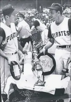  ?? Post- Gazette ?? World championsh­ip heroes Dick Groat, right, and Bill Mazeroski had a lot of hardware to pick up from the previous year as the 1961 season dawned at Forbes Field.