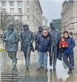  ?? ?? Father Phil Lamb, right, began his journey in Liverpool on Monday, April 1