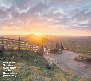  ??  ?? Red alert: Sunrise over Mam Tor in Derbyshire yesterday