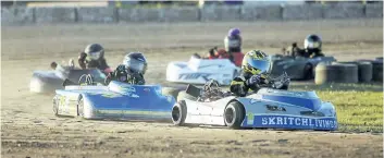  ?? BOB TYMCZYSZYN/STANDARD STAFF ?? BobCat of Hamilton kart racing series at Merrittvil­le Speedway in Thorold on Tuesday night.