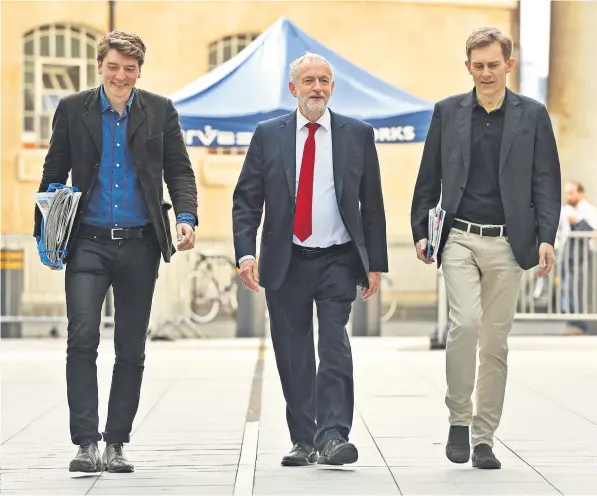  ??  ?? Jeremy Corbyn arrives at Broadcasti­ng House in London for the BBC’S Andrew Marr Show yesterday, where he said he was ready to press forward with his plans for government