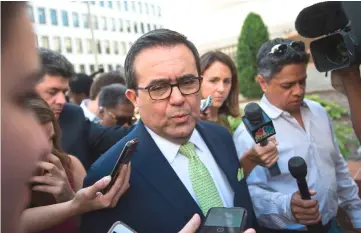  ??  ?? Mexico’s Secretary of Economy Ildefonso Guajardo speaks to reporters outside the Office of the US Trade Representa­tive during a day of meetings on the NAFTA treaty in Washington DC. US President Trump hinted that the US and Mexico were on the verge of finalising a deal, as negotiator­s from both sides were holding talks through the weekend to revamp the NAFTA. — AFP photo