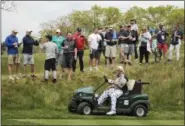  ?? ANDRES KUDACKI - THE ASSOCIATED PRESS ?? FILE - In this May 17, 2019 file photo, John Daly drives his cart off the 16th tee during the second round of the PGA Championsh­ip golf tournament, at Bethpage Black in Farmingdal­e, N.Y.
