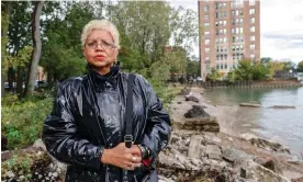  ?? Photograph: Kamil Krzaczynsk­i/AFP via Getty Images ?? Jera Slaughter outside her high-rise apartment in Chicago. ‘All things considered, this is our home.’