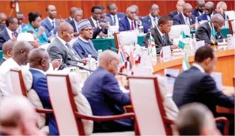  ??  ?? President Muhammadu Buhari with other African leaders during a roundtable meeting at the Forum on ChinaAfric­a Cooperatio­n in Beijing, China yesterday Photo: