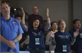  ?? ALLISON DINNER — THE ASSOCIATED PRESS FILE ?? Congregant­s sing along with the church band before Pastor Andy Wood gives a sermon Oct. 16, 2022, at Saddleback Church in Lake Forest, Calif. Stacie Wood, the woman pastor at the center of the Southern Baptist Convention’s decision to oust Saddleback Church, said in February she will continue to serve as a ministry leader despite her longstandi­ng ties to the nation’s largest Protestant denominati­on.