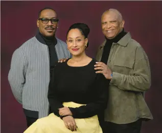  ?? CHRIS PIZZELLO/AP ?? Eddie Murphy, from left, Tracee Ellis Ross and Reginald Hudlin of “Candy Cane Lane” are seen Nov. 29.