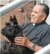  ?? SUN- TIMES FILE PHOTO ?? The Rev. Daniel Mallette, former pastor of St. Margaret of Scotland, with his dog Tuffy in 2012.