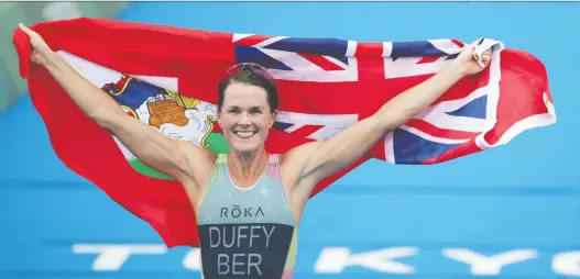  ?? HANNAH MCKAY/REUTERS FILES ?? Bermuda's Flora Duffy, who won gold in at the Tokyo Olympics, has won two World Triathlon Series championsh­ips.