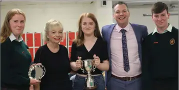  ??  ?? Aoife Rainey, winner of the Paul Ellis Cup, with the head girl and head boy, Principal Mary O’Dohery and Deputy Principal Simon Carey.