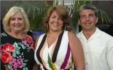  ?? Delia Johnson/ Post- Gazette photos ?? National Aviary executive director Cheryl Tracy with Theresa and Brandon Miles.