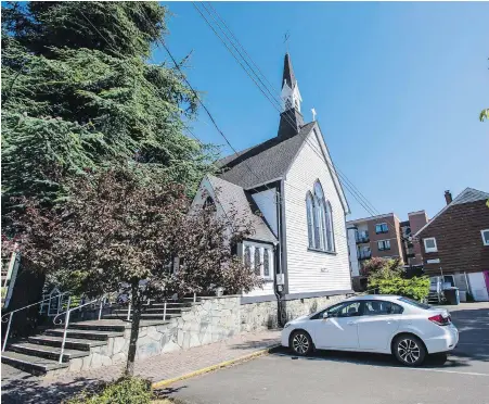  ?? DARREN STONE, TIMES COLONIST ?? The plan for adjacent affordable seniors’ housing includes a proposal to link 152-year-old St. Peter’s and St. Paul’s Church to a new building with a breezeway. That would require raising the existing stained-glass windows on the church’s west wall by two feet and installing doors.