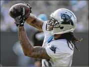  ?? CHUCK BURTON / ASSOCIATED PRESS ?? Wide receiver Kelvin Benjamin and the Panthers opened training camp Wednesday at Wofford College in Spartanbur­g, S.C.