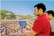  ?? — DC ?? A police personnel uses a drone to survey the crowd at the Sammakka and Saralamma on Friday.