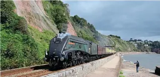  ?? DAVID HUNT ?? ‘A4’ No. 60009 Union of South Africa passes Spray Point on the approach to Teignmouth with the 09.10 Bristol Temple Meads-Kingswear ‘Torbay Express’ on August 18 last year. The summer excursions will not be running this year.