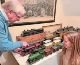  ?? ?? Role model: Valentina Potter takes a break from fundraisin­g for the Ukraine to admire part of her father-in-law Barry’s model train collection. She and her husband Ellis have to date raised more than £80,000 in aid of the wartorn country’s residents, that sees vital supplies going in and refuges taken out. ELLIS POTTER