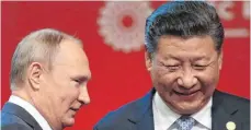  ?? FOTO: DPA ?? Zwei der Mächtigste­n der Welt: der russische Präsident Vladimir Putin (li.) und Xi Jinping aus China beim Apec-Gipfel in Südamerika.