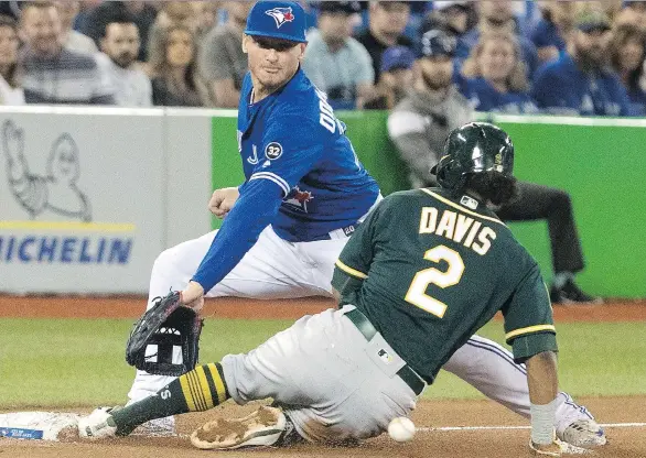  ?? FRED THORNHILL/THE CANADIAN PRESS ?? The future of Toronto Blue Jays third baseman Josh Donaldson remains cloudy as the former MVP continues to be sidelined with a calf injury.