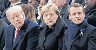  ?? Afp/archivo ?? Trump, Merkel y Macron, en 2018, al conmemorar el fin de la Segunda Guerra Mundial