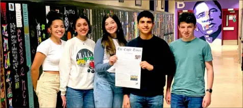  ?? Photos courtesy of Joe Ehman ?? The staff of The Eagle Times, Obama Academy’s new student newspaper, from left: Mariah Gaines, 16; Diya Singh, 15; Norma Fruzynski, 15; Aavin Mangalmurt­i, 15; and Isaiah Trumbull, 15.