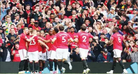  ??  ?? Manchester United players celebratin­g their incredible massacre of Chelsea at Old Trafford on Premier League Match- day One