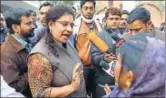  ?? SUBHANKAR CHAKRABORT­Y/HT ?? National Aids Control Organisati­on and UP State Aids Control Society members talk to an HIV patient in Uttar Pradesh’s Unnao on Wednesday.